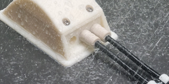 Close up of aerogland in rain showing waterproofing qualities